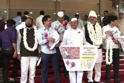 Maharashtra: NCP MLAs arrive at Assembly with onion garlands, seek appropriate prices