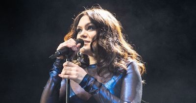 Pregnant Jessie J shows off her baby bump in see-through outfit during acoustic gig