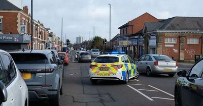 Man taken to hospital after motorbike crashes into parked car in Walker