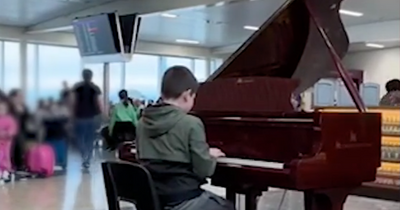 Watch as young schoolboy stuns Scots airport passengers with Snow Patrol piano cover