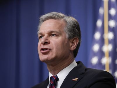 Wray publicly comments on the FBI's position on COVID's origins, adding political fire