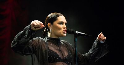 Pregnant Jessie J shows off her baby bump in see-through jumpsuit on stage in London