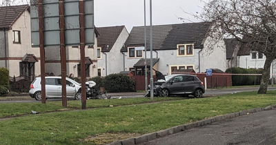 Two drivers rushed to hospital after head-on smash on Scots road