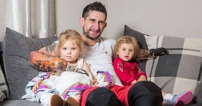 Dad who lost all his limbs in freak accident is finally able to hold his daughters again