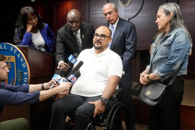 Man paralyzed by officer who mistook gun for Taser sues