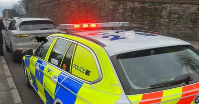 Edinburgh Porsche driver slapped with fine after being caught using mobile phone