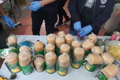 8.5kg of heroin found stuffed into fruit cans