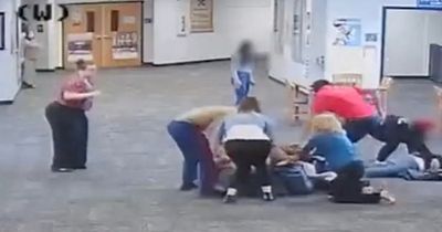 Teacher knocked unconscious by 19 stone student after he claims she took his game console