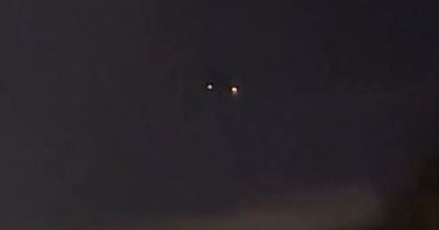 Cumbernauld dog walker spots 'UFOs' hovering in the night sky as he filmed 'two lights'