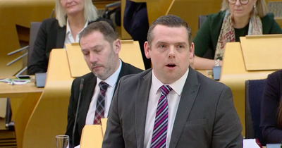 Douglas Ross apologises for using 'industrial language' in parliament after protesters interrupt him