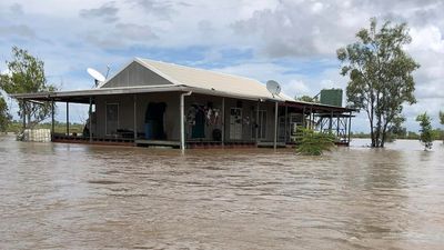 Calls for aid in Doomadgee, residents face weeks trapped by floodwater with 'bare' supermarket shelves