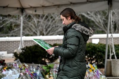 'Hard to do': Flowers removed after Michigan State shooting