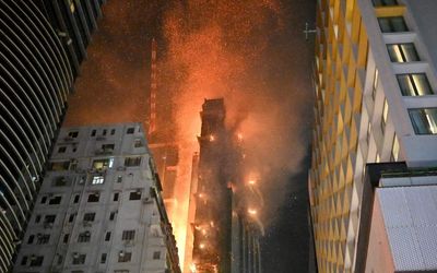 Firefighters battle Hong Kong shopping district blaze