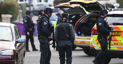 Armed police and dogs unit descend on home after raid