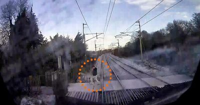 Heart-stopping moment 125mph high speed train narrowly misses man on level crossing