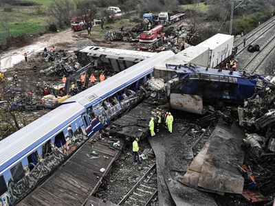 A Greek train driver was told to ignore a red light before a head-on crash killed 57