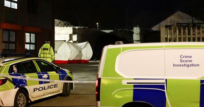 Crime scene investigators descend on skip yard as police cordon off area