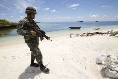 Manila: Chinese ships 'loitering' near disputed island