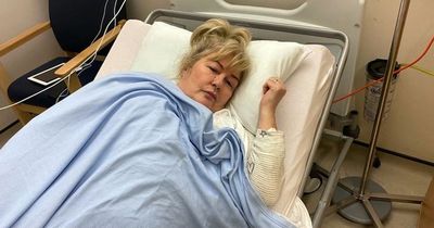 Woman holding Glasgow hospital lie-in demands operation for 'crippling' back pain