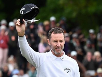 Australian golfer Brendan Jones salutes at the NZ Open
