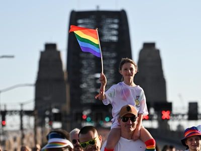 Thousands march across Harbour Bridge to support pride