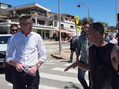 'Come see the homeless': Beach visit plea for Perrottet