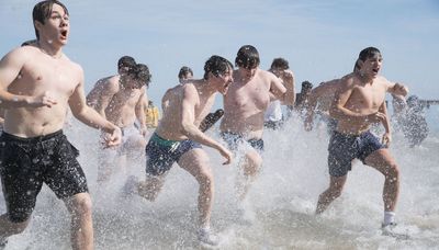 Polar plungers brave chilly water on sunny day at North Avenue Beach