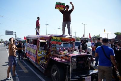 Drivers stage strike over plan vs aging Philippine jeepneys