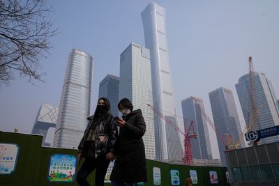 Chinese planners promise 12 million jobs, economic rebound