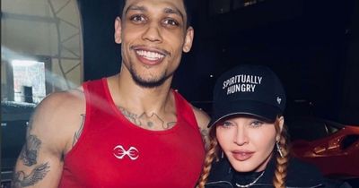 Madonna shows off her youthful looks as she watches 'new toyboy' Joshua Popper's fight