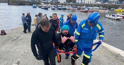 Cornwall surfer attacked by seal, breaks leg then is too tall for ambulance