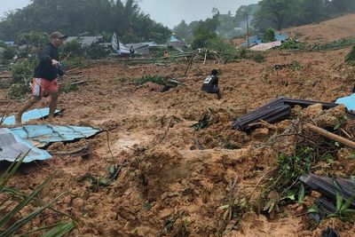 Landslide in Indonesia kills at least 11; dozens missing