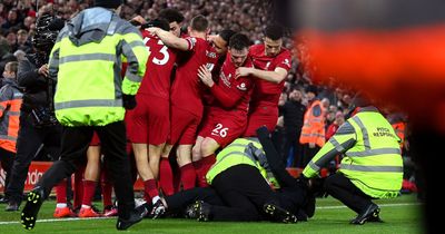 Teenager arrested after pitch invader collides with celebrating Liverpool players during 7-0 win over Manchester United