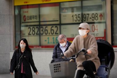 Asian shares mixed as investors watch Fed moves, inflation