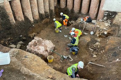 Evidence of Roman shrine uncovered during archaeological dig in graveyard