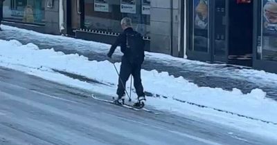 Scots baffled as man spotted skiing on city centre street as snow blankets Aberdeen