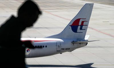 Families of MH370 victims push for another search as technology firm says it has new evidence