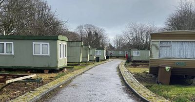 Haunting pictures of ghost town caravan park on banks of beautiful Scottish river