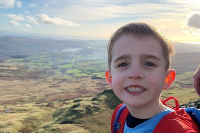 Boy, six, tackling climbing challenge opens holiday lodges for ‘poorly children’
