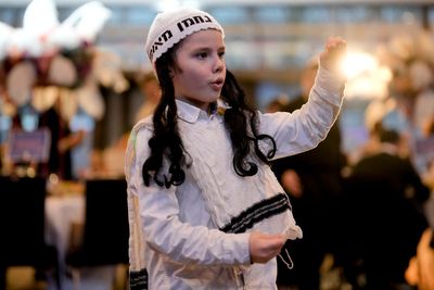 Ukrainian refugees celebrate Purim in Berlin as war drags on