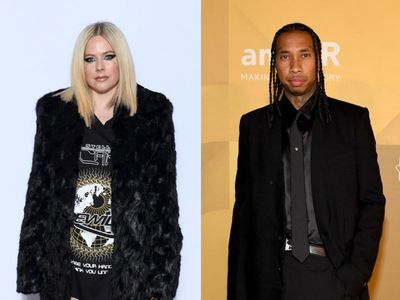 Avril Lavigne and Tyga seemingly confirm relationship with kiss during Paris Fashion Week