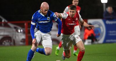 Larne and Linfield share the spoils in tense title battle