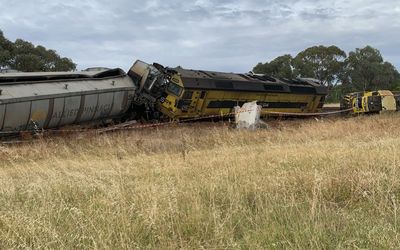 Train derails after colliding with truck, three injured