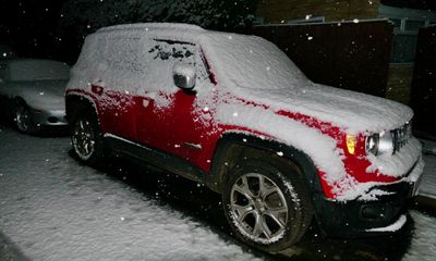 UK weather: snow, ice and hail warnings follow coldest night of the year – as it happened