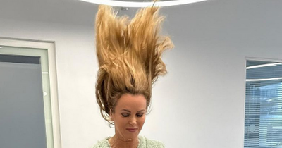 Fans ask Amanda Holden where her pants are as she shares gravity defying picture