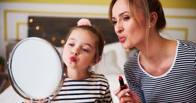 Mum sparks debate by allowing eight-year-old daughter to wear make-up as husband fumes