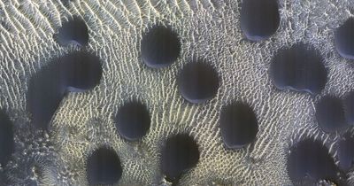 Baffled NASA scientists spot 'almost perfectly circular' sand dunes on surface of Mars