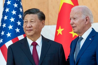 China accuses Washington of trying to block its development to limit global influence