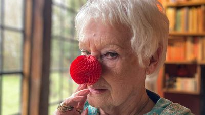 Dame Judi Dench dons ‘very clever’ red nose for Comic Relief