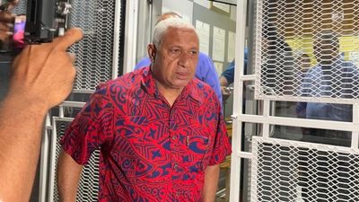 Fiji's former prime minister Frank Bainimarama charged with abuse of office, to spend the night in custody